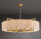 modern round alabaster chandelier in gold – statement lighting for living rooms, foyers, and luxury homes