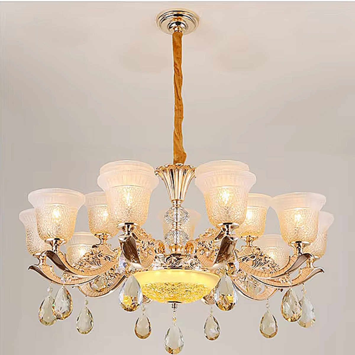 Luxury gold zinc alloy frame chandelier with teardrop crystals, warm 3500K glow, lounge setting — LINKORI TULLIPH