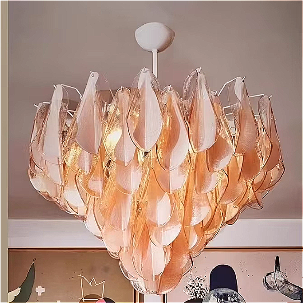 Sculptural Murano chandelier as a pink glass art piece — luxury pendant lighting that doubles as decor in modern and high-end interiors.