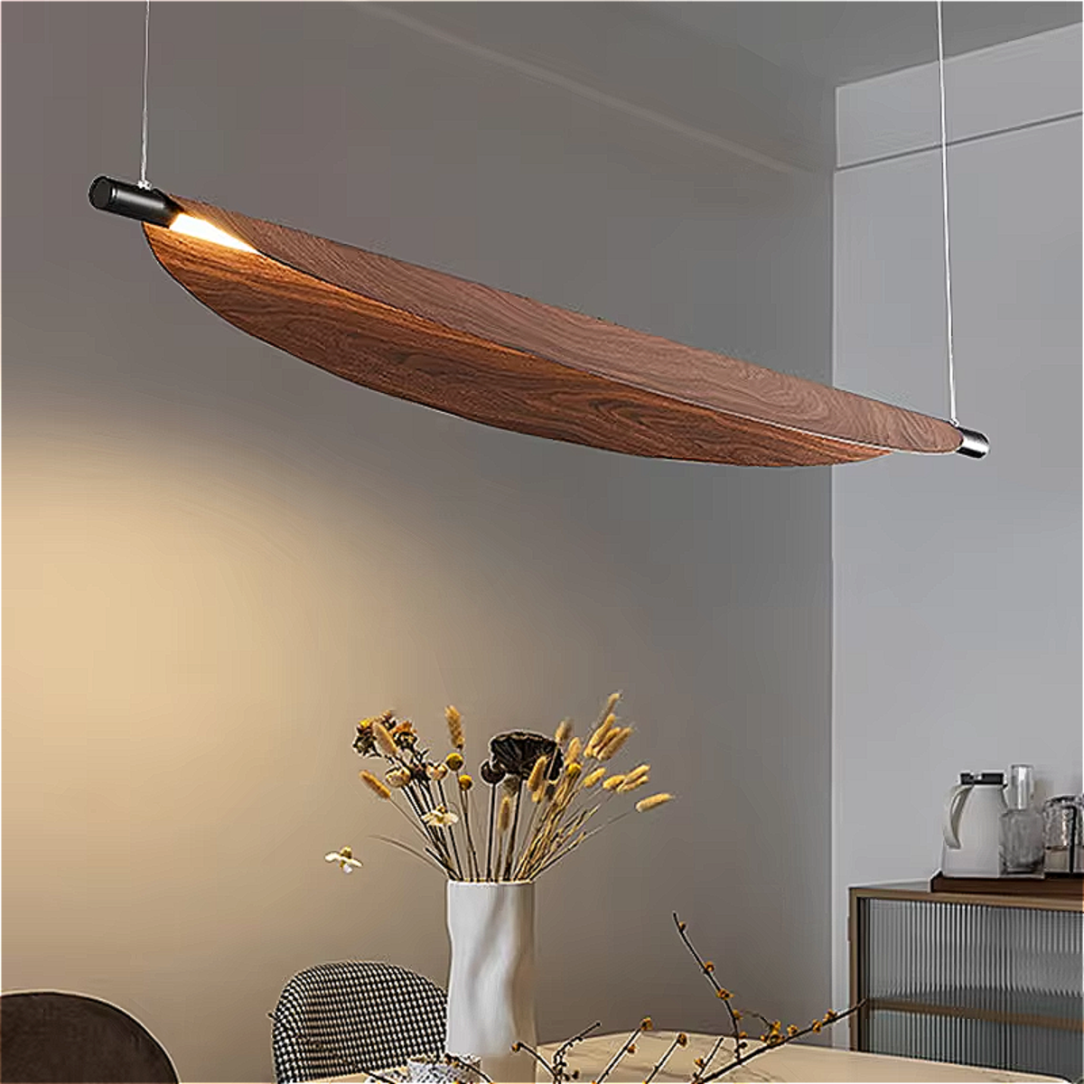 LINKORI VELLO KAYAQ walnut wood chandelier hanging in a minimalist living space with warm ambient light