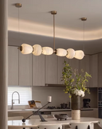 Modern dining room interior with alabaster linear chandelier, 6-light kitchen island style pendant lighting – LINKORI