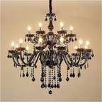 Black crystal 18-light chandelier hanging in a luxurious dining room – castlecore and gothic elegance by LINKORI JANJULIQ.