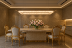 luxury modern interior with Spain alabaster rectangular chandelier over dining table, sculptural pendant light