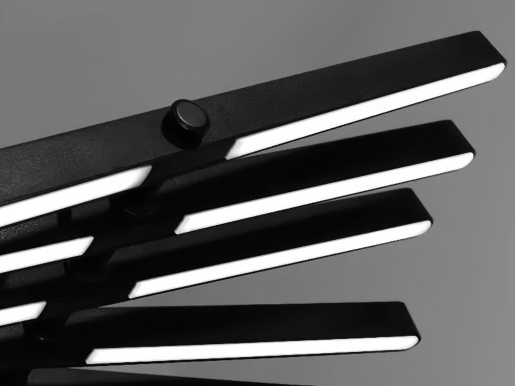 Detail of Warm White Glow Emitting from Adjustable LED Sticks – LINKORI Black Stick Lighting Design