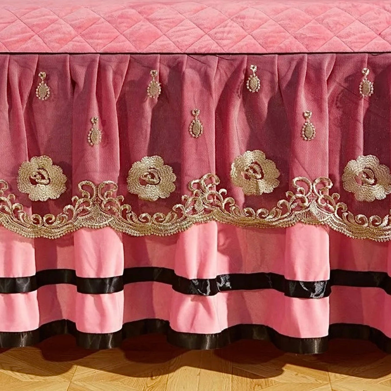 Romantic blush pink velvet comforter set with ornate bed skirt, feminine luxury bedroom style