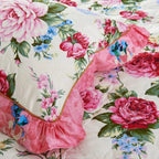 Floral bedding set with pink roses and green leaves on a Ivory background