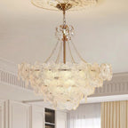 LINKORI SHALOLLYE floral chandelier hanging in a modern luxury living room with neutral tones and gold accents.