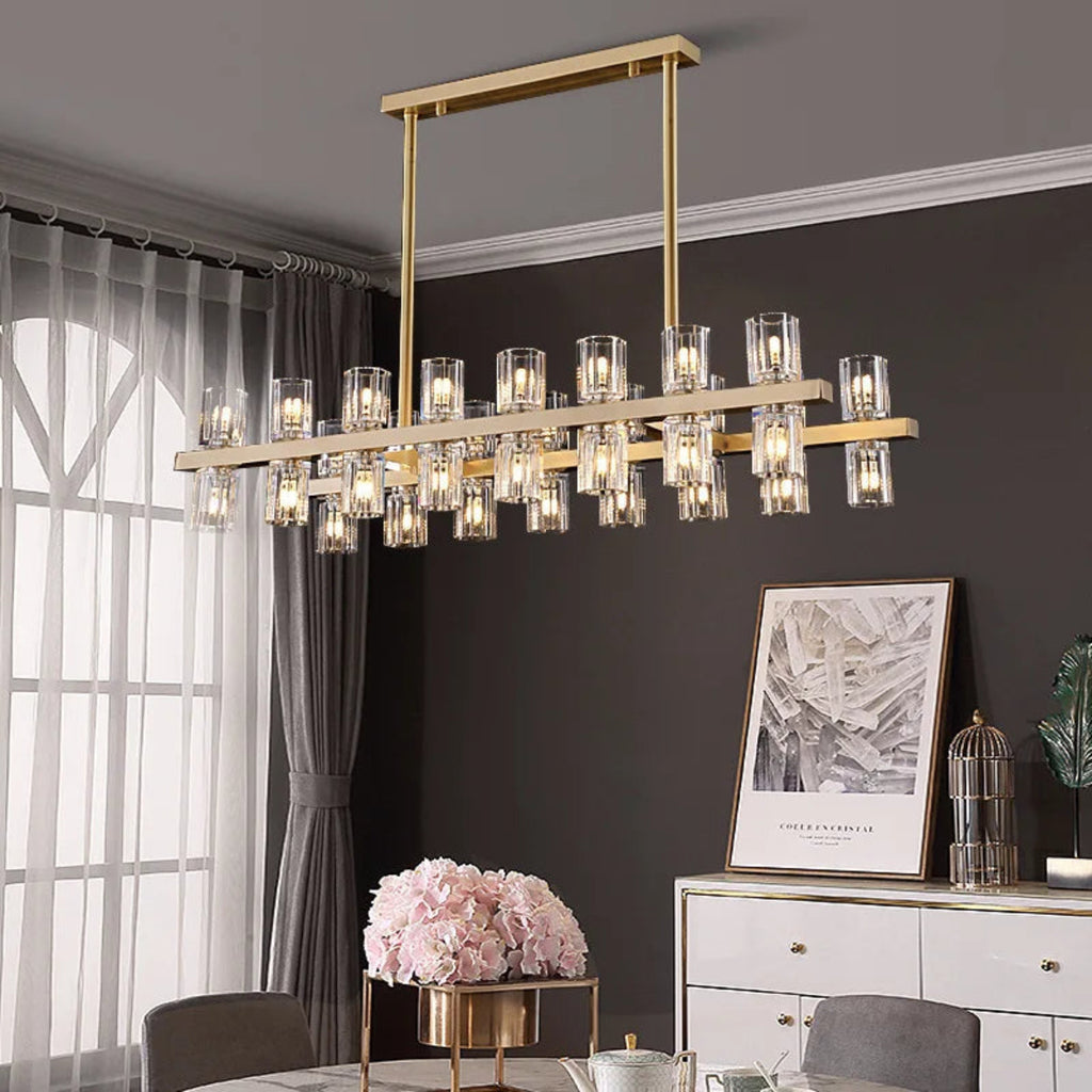 Luxury gold crystal linear chandelier with hexagonal glass prisms in modern luxury dining room interior – LINKORI HEXANDLE