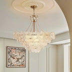 Elegant classic room with LINKORI SHALOLLYE chandelier glowing in warm light, enhancing crown molding and ornate detailing.