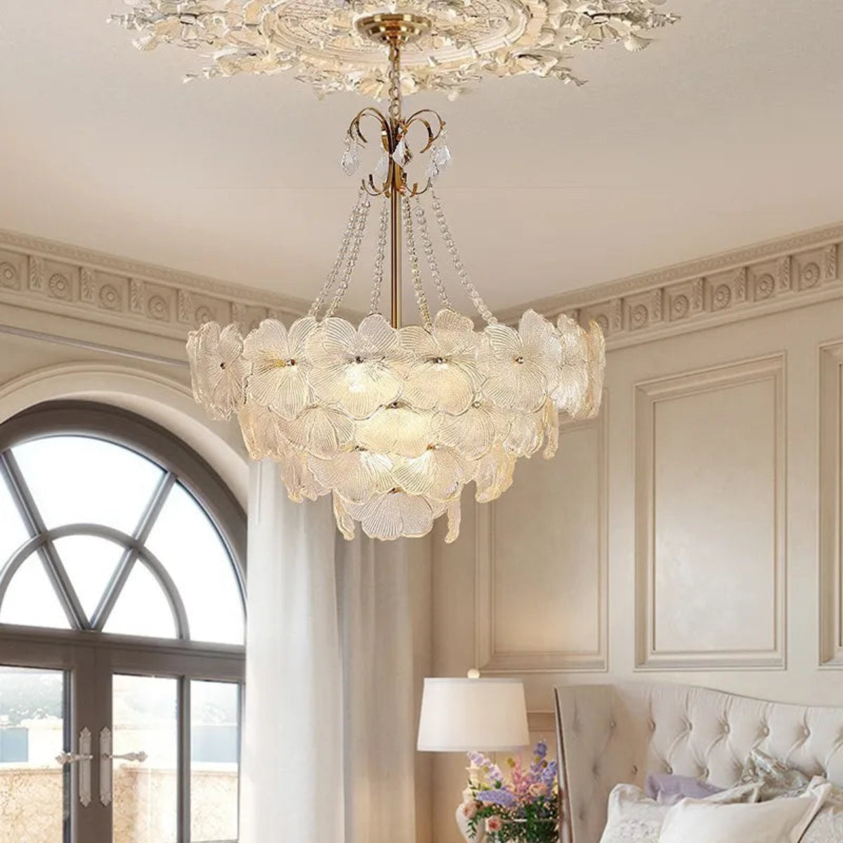 LINKORI SHALOLLYE chandelier lighting up a high-ceiling luxury bedroom .