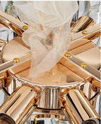 Close-up detail of precision-cut teardrop crystals on luxury chandelier for contemporary dining room 