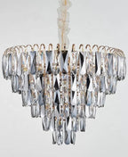 Crystal chandelier creating sparkling light effects and rainbow prisms through precision-cut teardrops with 110 lm/W LED efficiency
