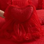Heart-shaped lace pillow on red ruffle bedding — tatting lace, decorative cushion for romantic bedrooms, bridal/wedding bedding, vintage & shabby-chic style | LINKORI Racelet Red heart pillow view