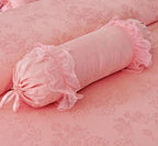 Candy bolster pillow on pink ruffle lace duvet cover — lace-trim ends, cotton twill (600TC), romantic/bridal bedroom styling, cottagecore aesthetic | LINKORI Lacelet Pink bolster view