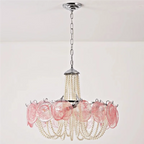 Pink Murano-style glass disc chandelier in modern interior — pearl-beaded Art Deco statement pendant for dining room & foyer, chrome finish, warm ambient light | LINKORI PALACE installed