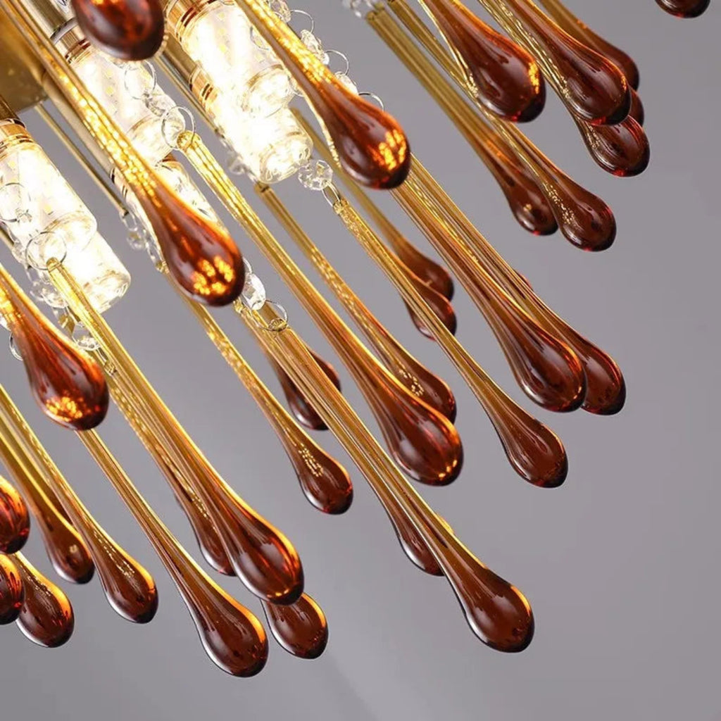 cascading amber glass chandelier in gold finish, modern glam pendant for dining rooms
