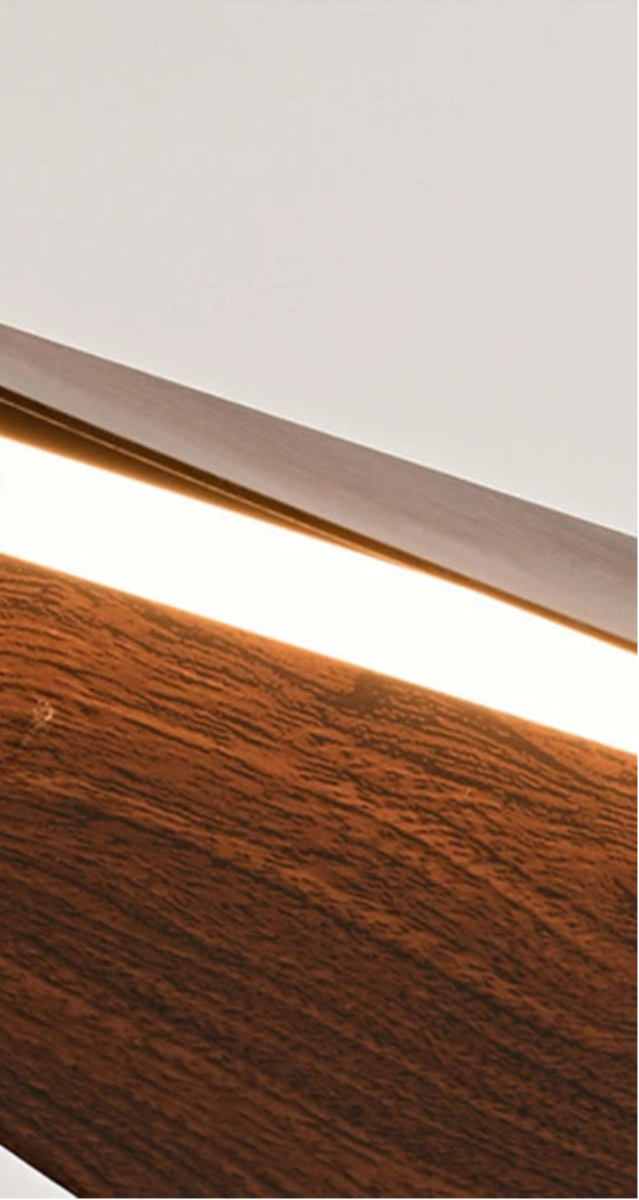 Close-up of curved walnut veneer and fine wood grain details on the LINKORI VELLO KAYAQ pendant light