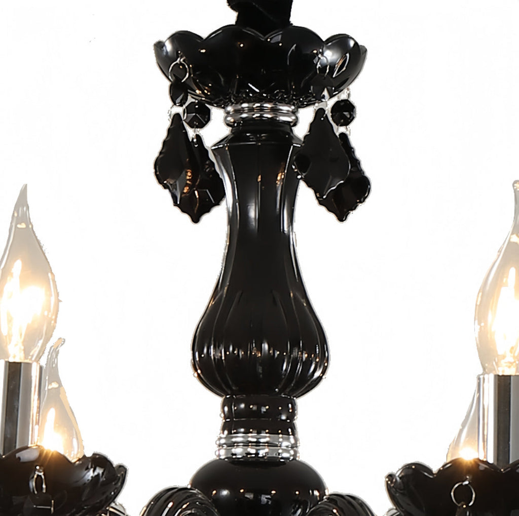 Black crystal glass surface texture in detail – handcrafted elegance of LINKORI JANJULIQ chandelier.