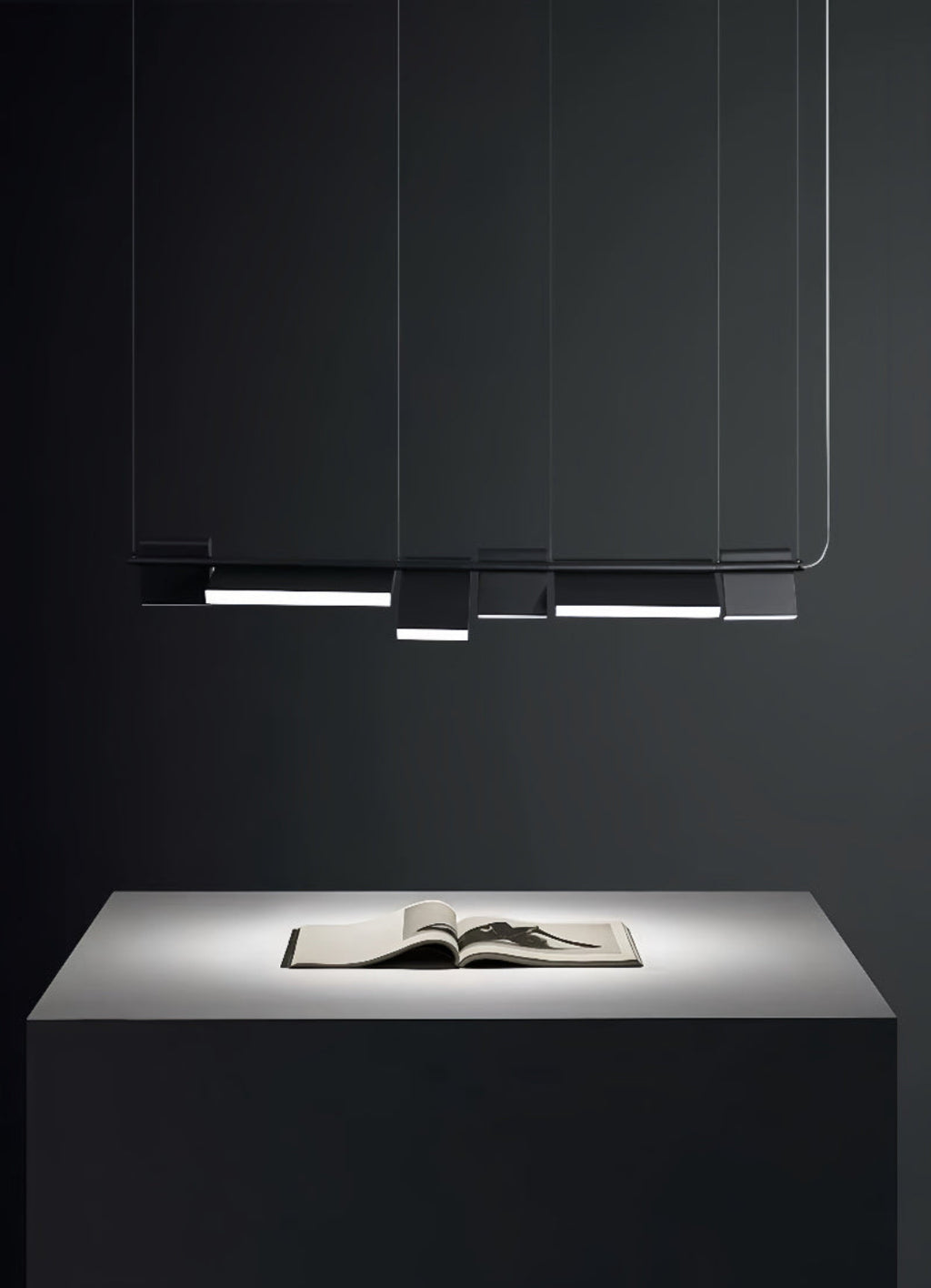 Luxury contemporary dining room chandelier – sculptural black modular LED pendant with customizable panels for modern statement lighting | LINKORI MODULQ BLACK LINE.