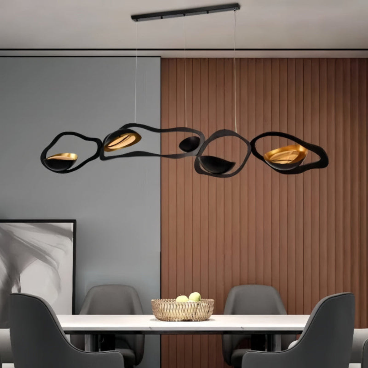 Sculptural Black and Gold LED Chandelier in Contemporary Dining Room — bold wave-shaped pendant light in modern neutral interior