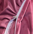 Elegant mauve pink velvet bedding set with golden embroidered floral details for luxury refined homes