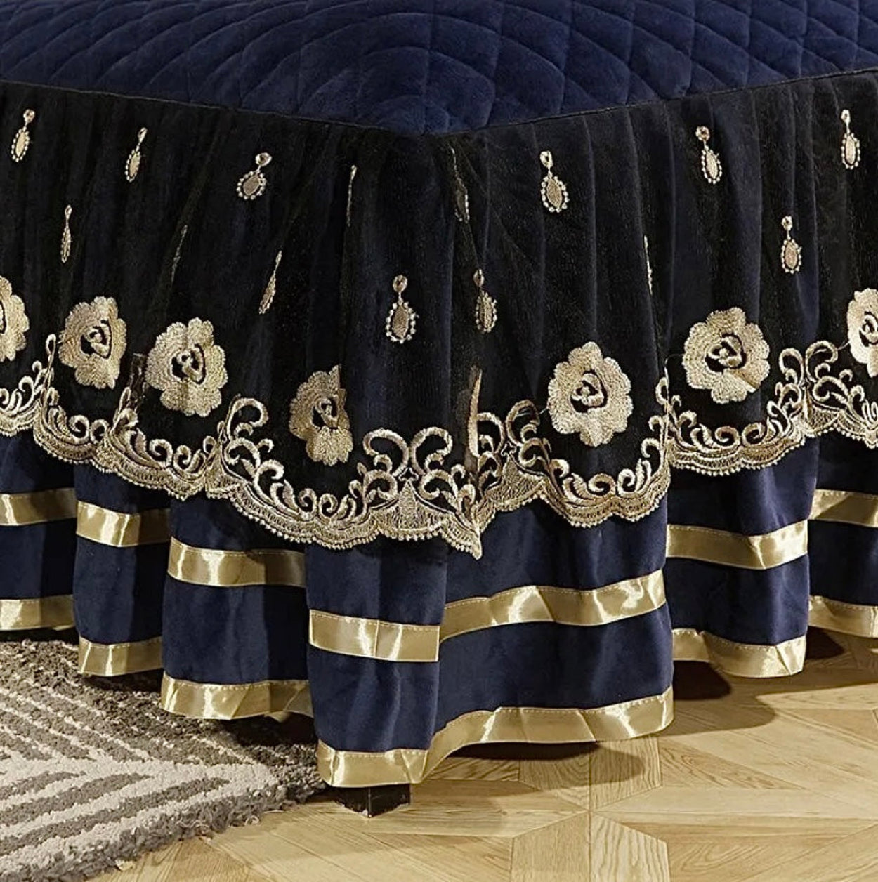 Royal navy blue velvet comforter set with ornate bed skirt, classic luxury bedroom style