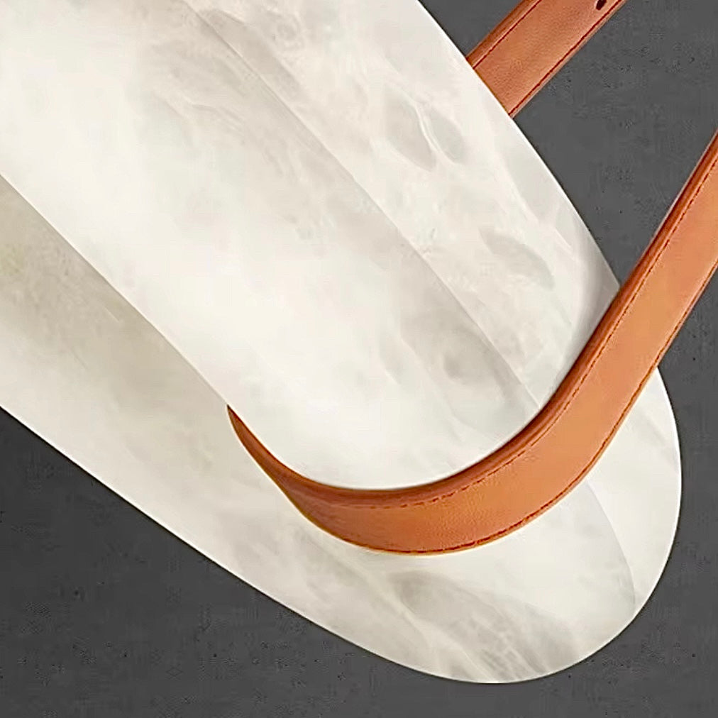 Close-up of alabaster ring pendant light highlighting natural stone texture