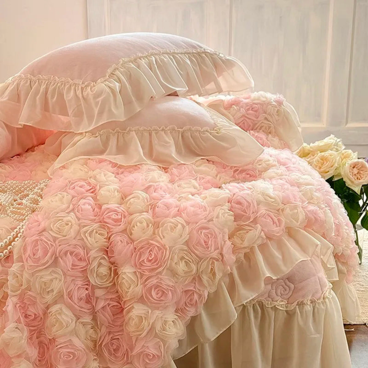 Blush pink cottagecore duvet cover set with ivory ruffled lace trim, velvet pillow shams, and rose blossom accents — romantic bedroom.