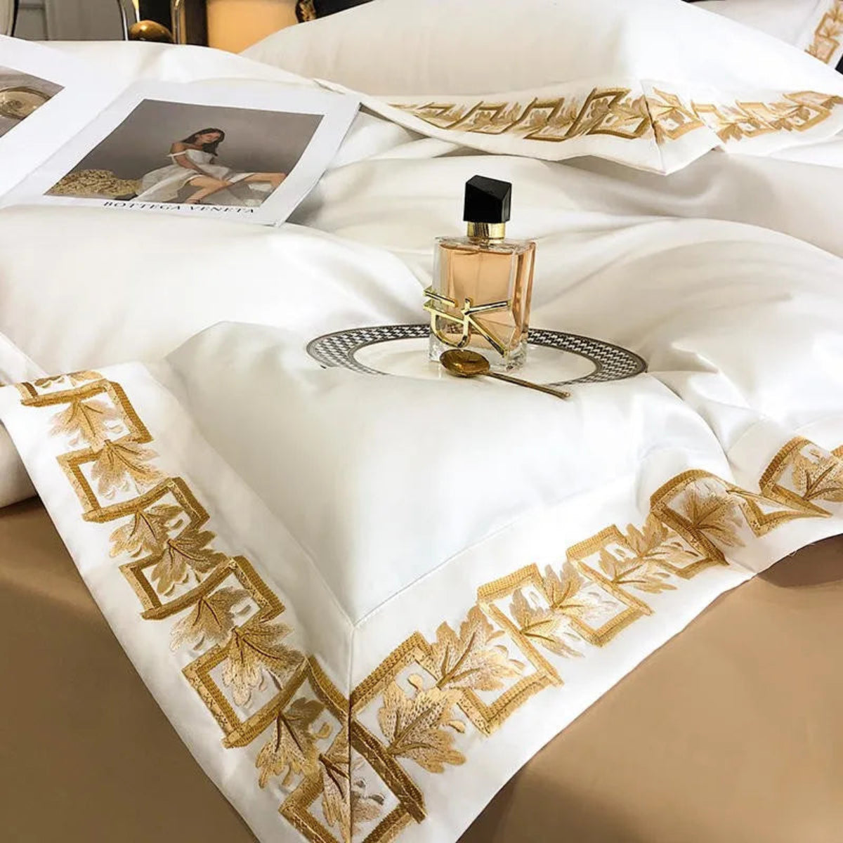 Glam white duvet cover set with gold embroidered trim – 4-piece Egyptian cotton bedding for chic contemporary bedrooms.