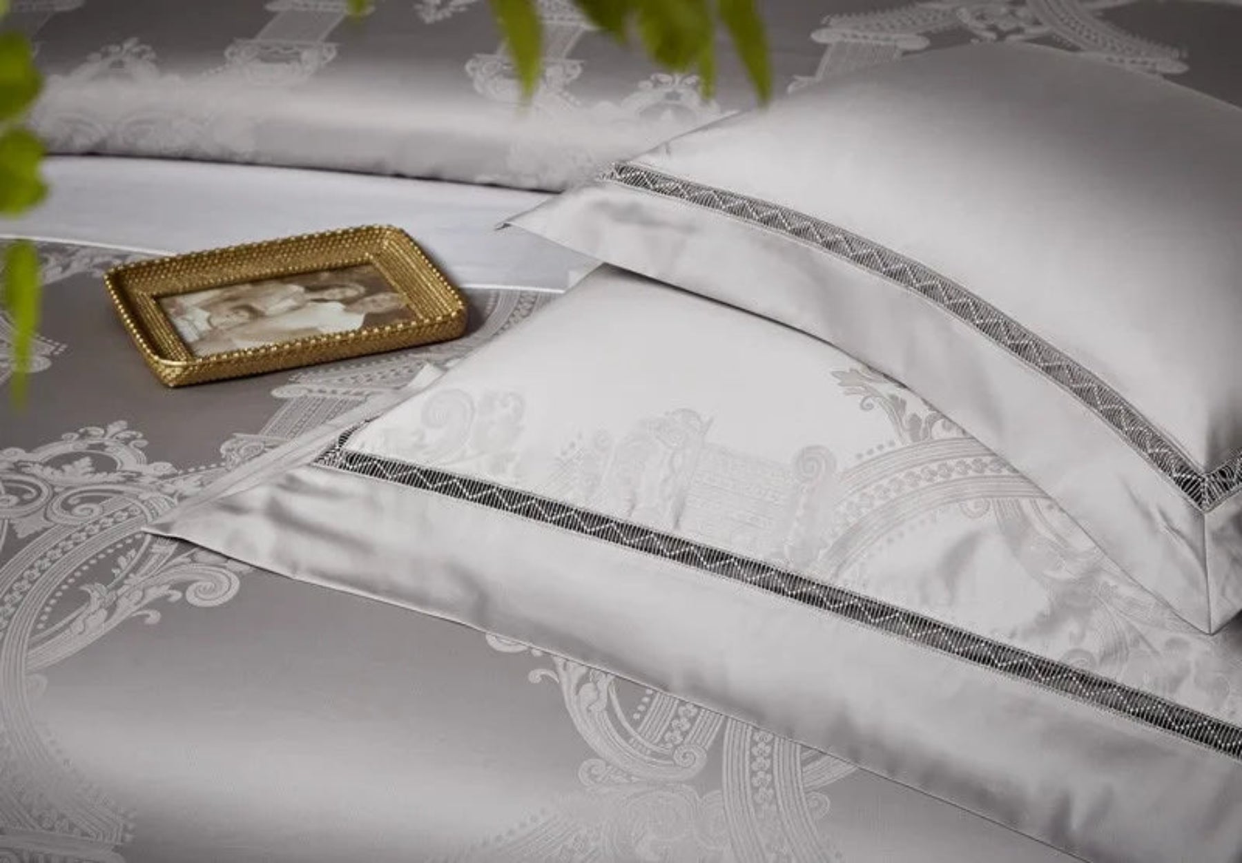 High-quality 1200TC cotton satin bedding with intricate silver grey damask patterns and couture trim borders