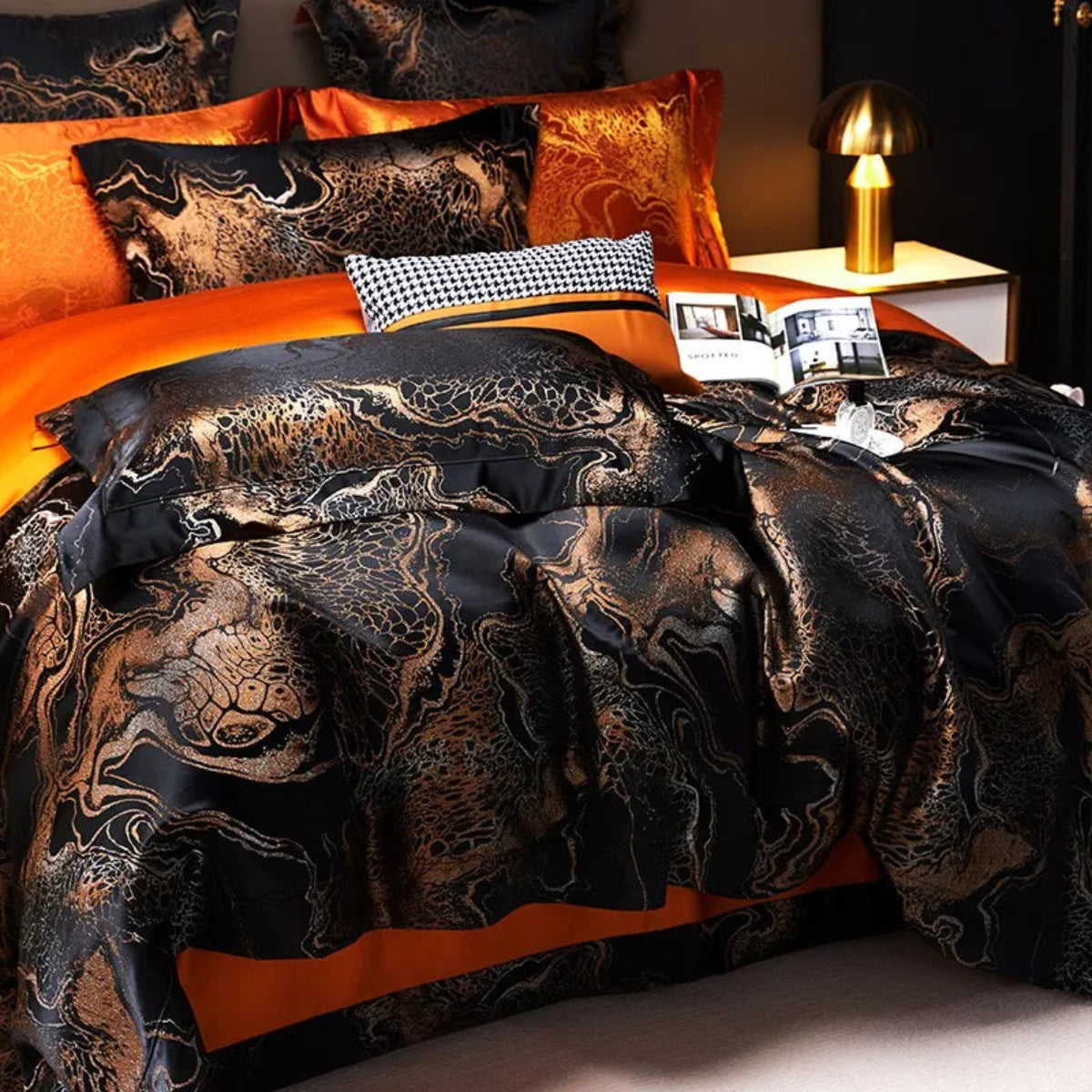Luxury black satin jacquard bedding with metallic copper accents in modern luxury bedroom
