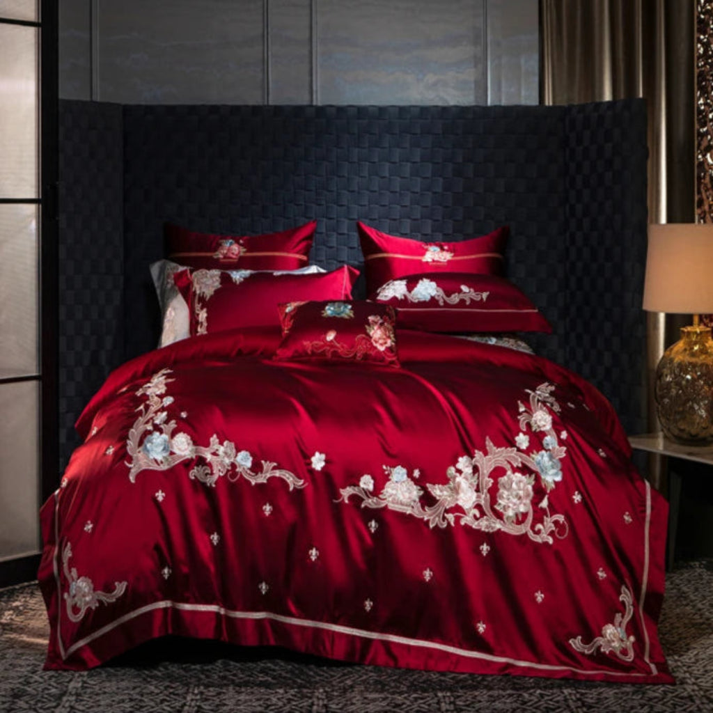 Bold red satin cotton duvet cover set with romantic floral embroidery for passionate bedroom decor