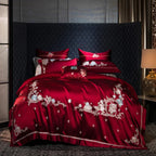 Bold red satin cotton duvet cover set with romantic floral embroidery for passionate bedroom decor
