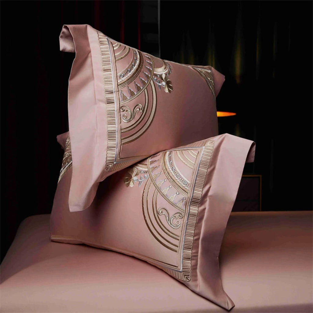 High-end rose gold embroidered duvet set featuring Art Deco geometric design on premium cotton fabric