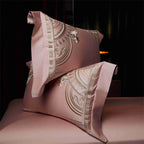 High-end rose gold embroidered duvet set featuring Art Deco geometric design on premium cotton fabric