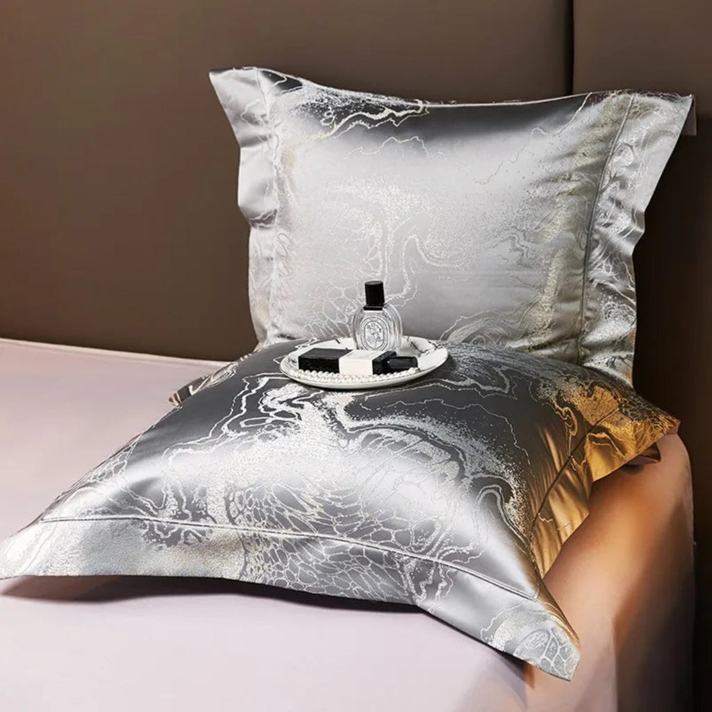 Luxury silver grey bedding showcasing traditional Asian dragon motifs in shimmering jacquard weave