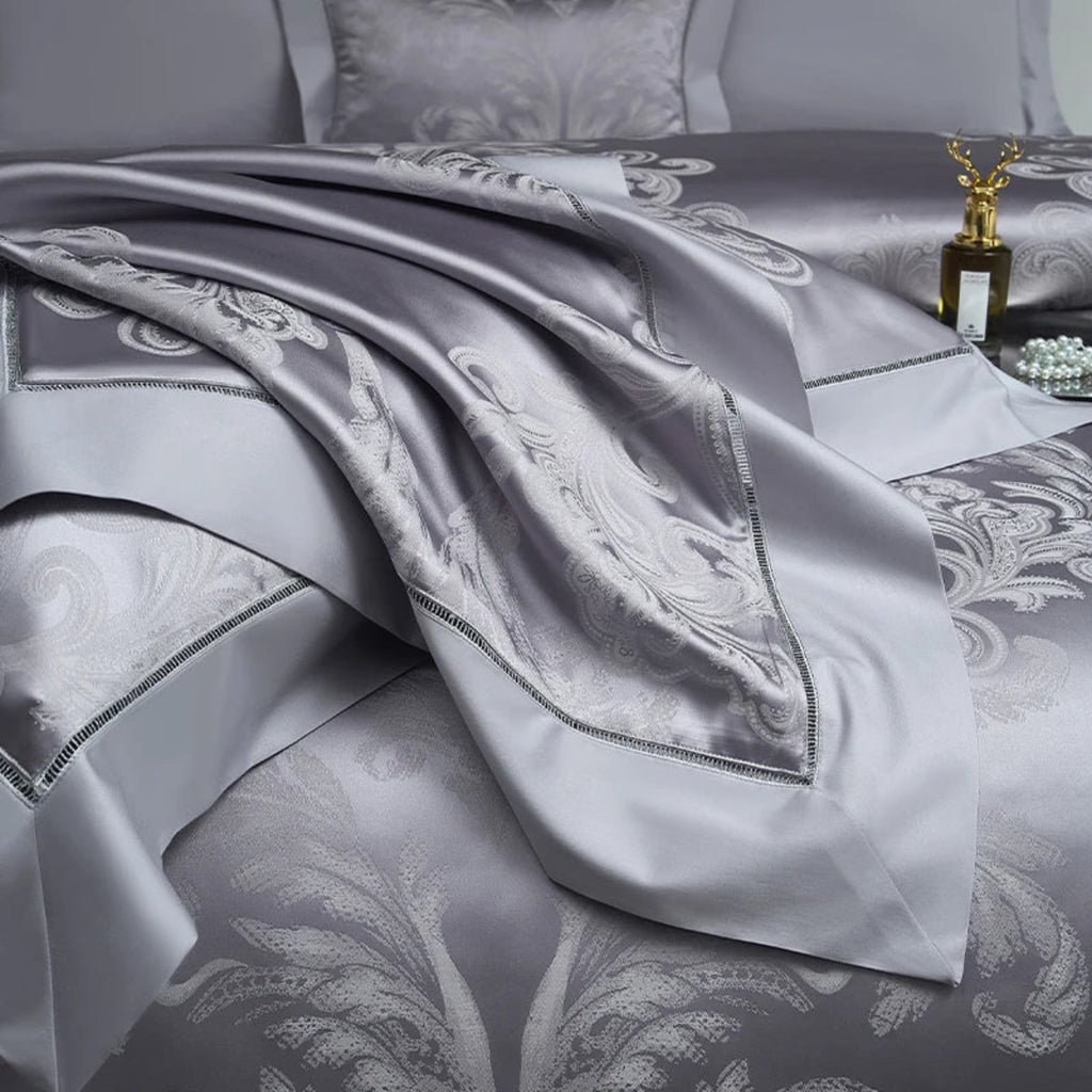High-quality 1000TC cotton satin bedding with intricate baroque damask patterns and decorative borders