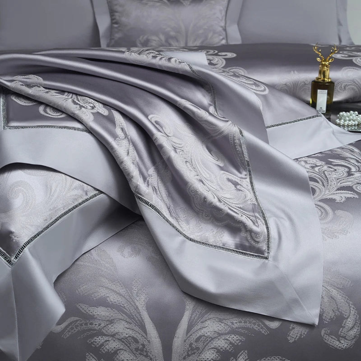 High-quality 1000TC cotton satin bedding with intricate baroque damask patterns and decorative borders