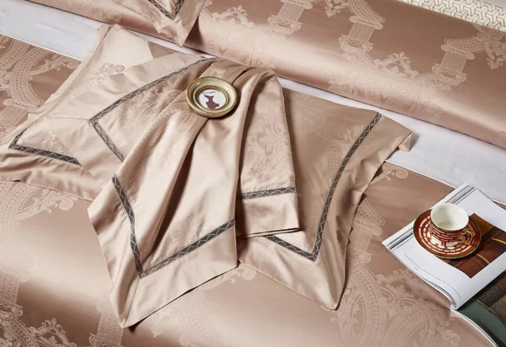 Ultra-luxury cotton satin duvet cover displaying elegant champagne beige damask jacquard motifs with designer trim
