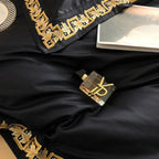 Luxury embroidered black bedding with gold leaf trim, Egyptian cotton 4-piece duvet cover set for statement bedrooms – LINKORI Blacklabel