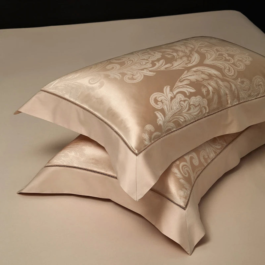 Luxury blush gold bedding set showcasing baroque damask motifs in lustrous Egyptian cotton satin fabric