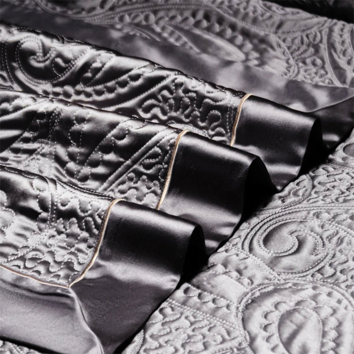 Dark grey satin jacquard duvet cover set with elegant paisley embossed pattern – quiet luxury bedding style