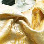Gold marbled satin fabric close-up showing jacquard texture and sheen, LINKORI The Royal Gold