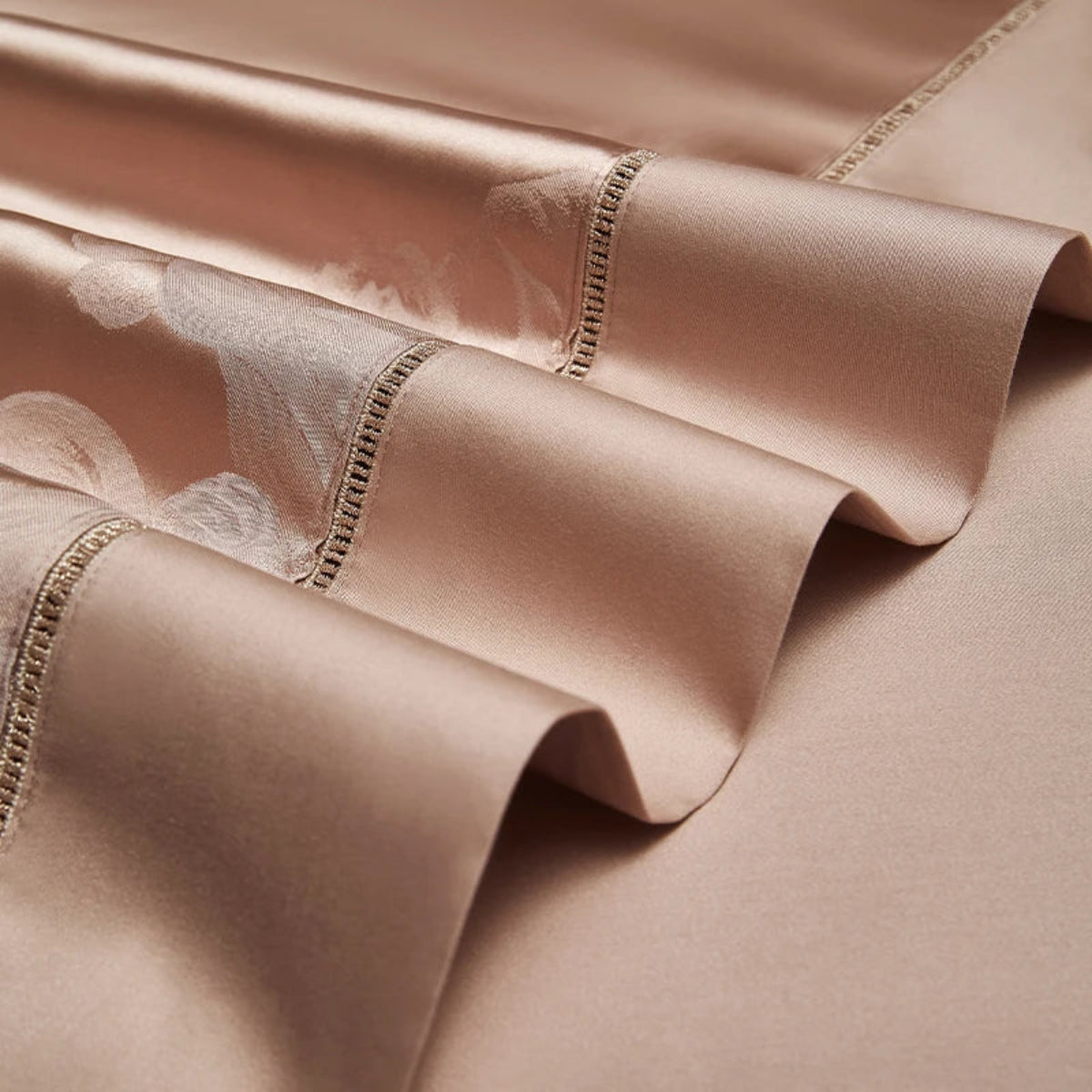 Elegant floral jacquard duvet cover in rose gold cotton satin with contemporary romantic bedroom design