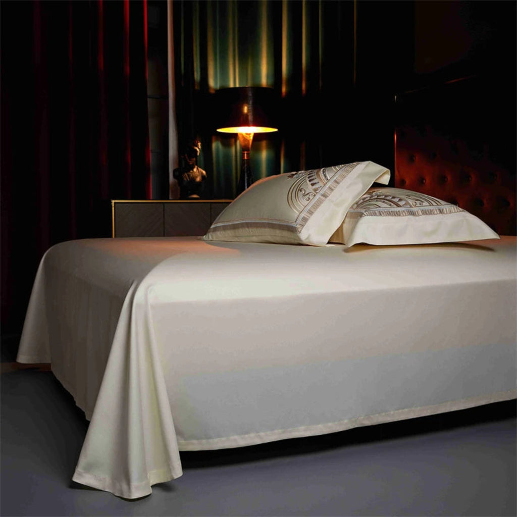 Luxury ivory bedding with gold embroidered fan arch motifs hotel style bedroom