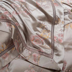 Premium Egyptian cotton duvet cover set featuring soft mauve florals and satin finish