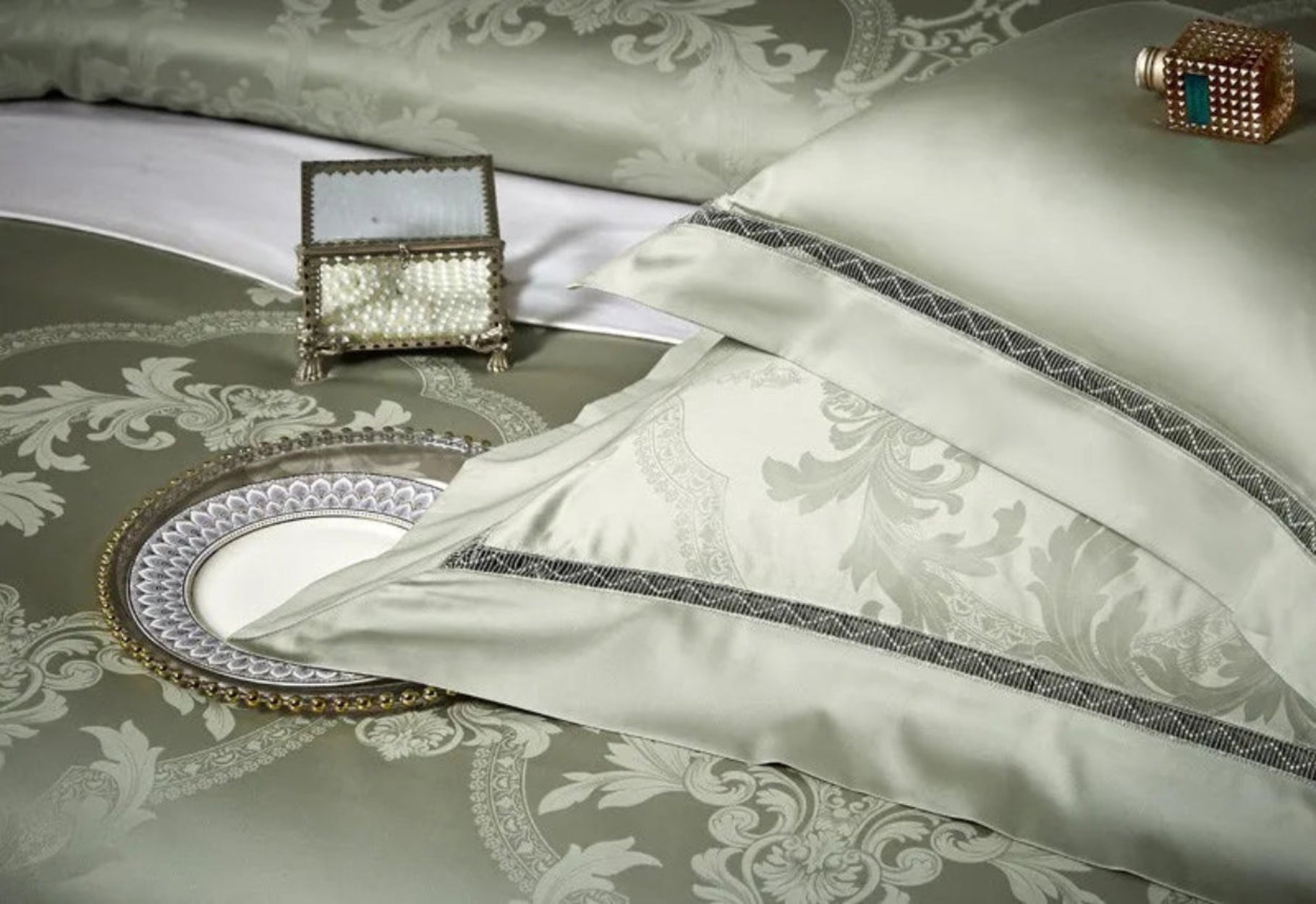 Luxury sage green bedding set showcasing architectural damask motifs ideal for guest bedroom and boutique hotel decor