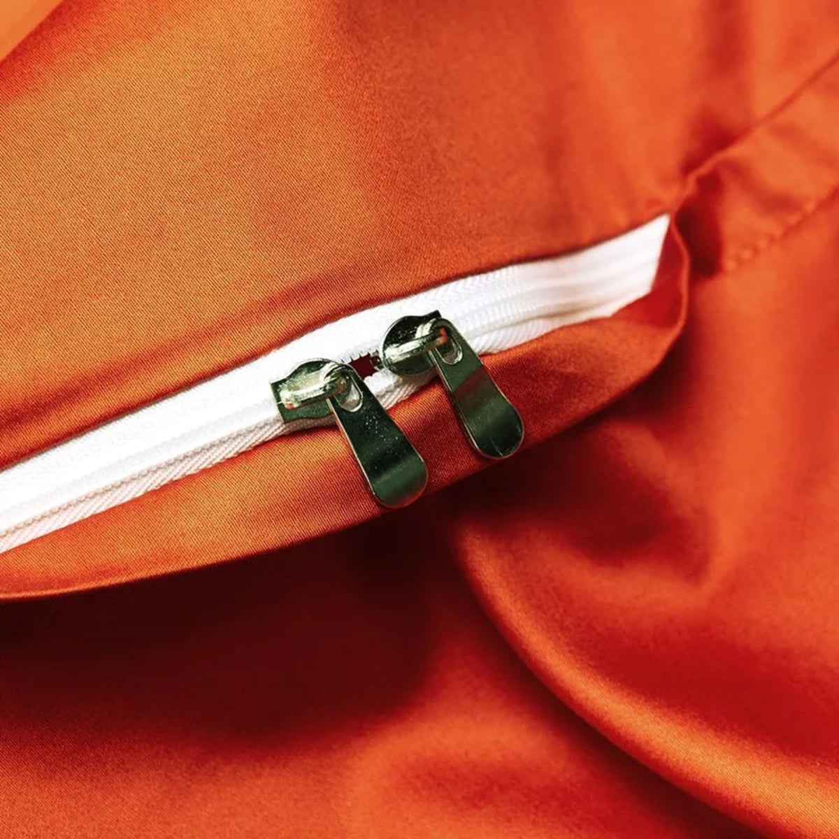 Burnt orange duvet corner drape, floor-length flat sheet visible — LINKORI The Royal Orange