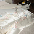 Luxury floral embroidered duvet cover set with blush pink and blue roses on ivory satin Egyptian cotton bedding