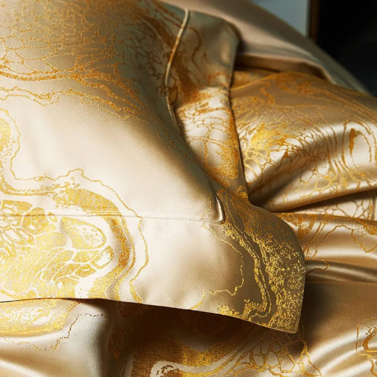 High-end silk feel gold satin jacquard duvet cover set in luxury bedroom